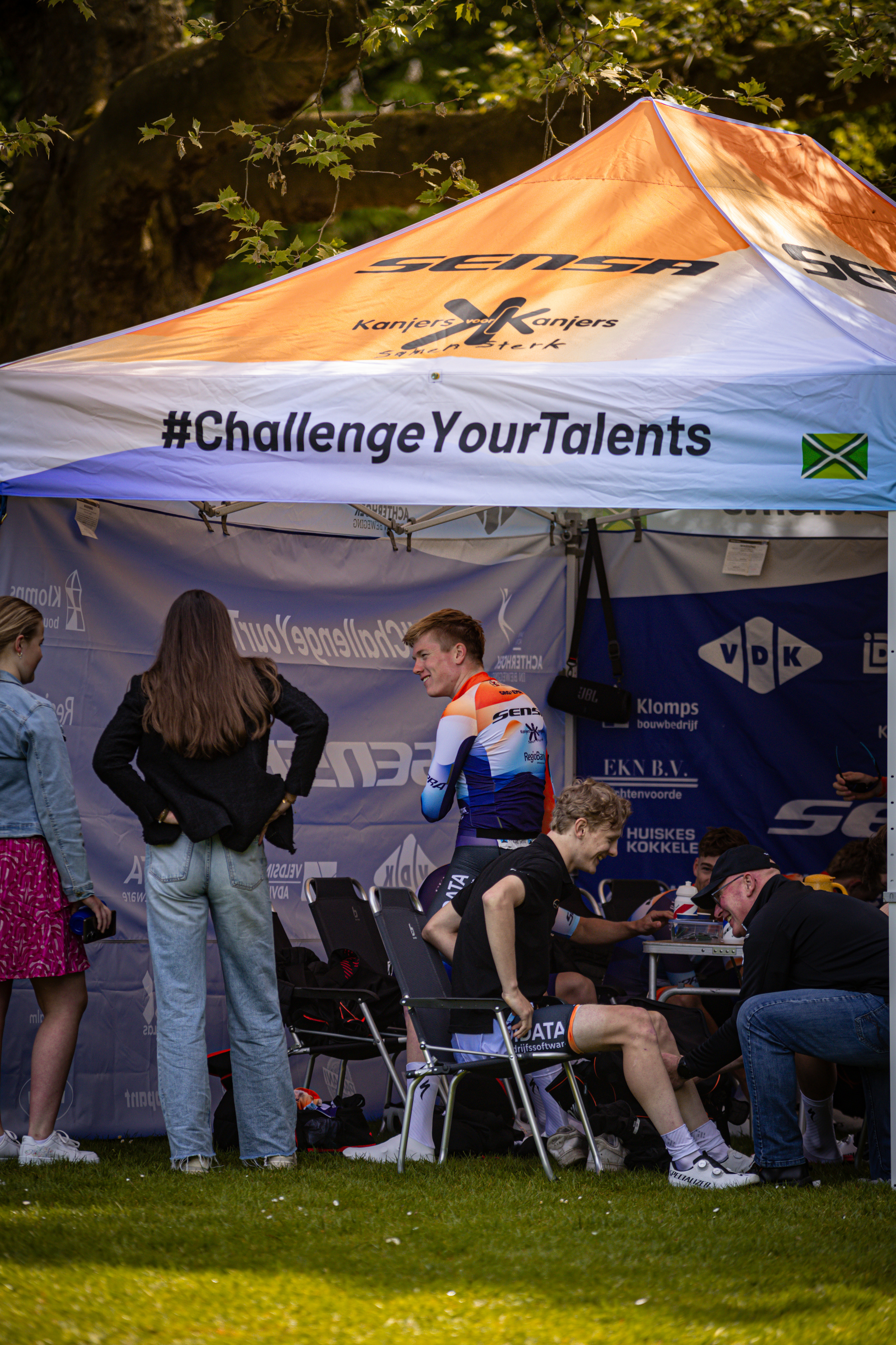 Wielrennen has a tent with the words "Challenge Your Talents" written on it.