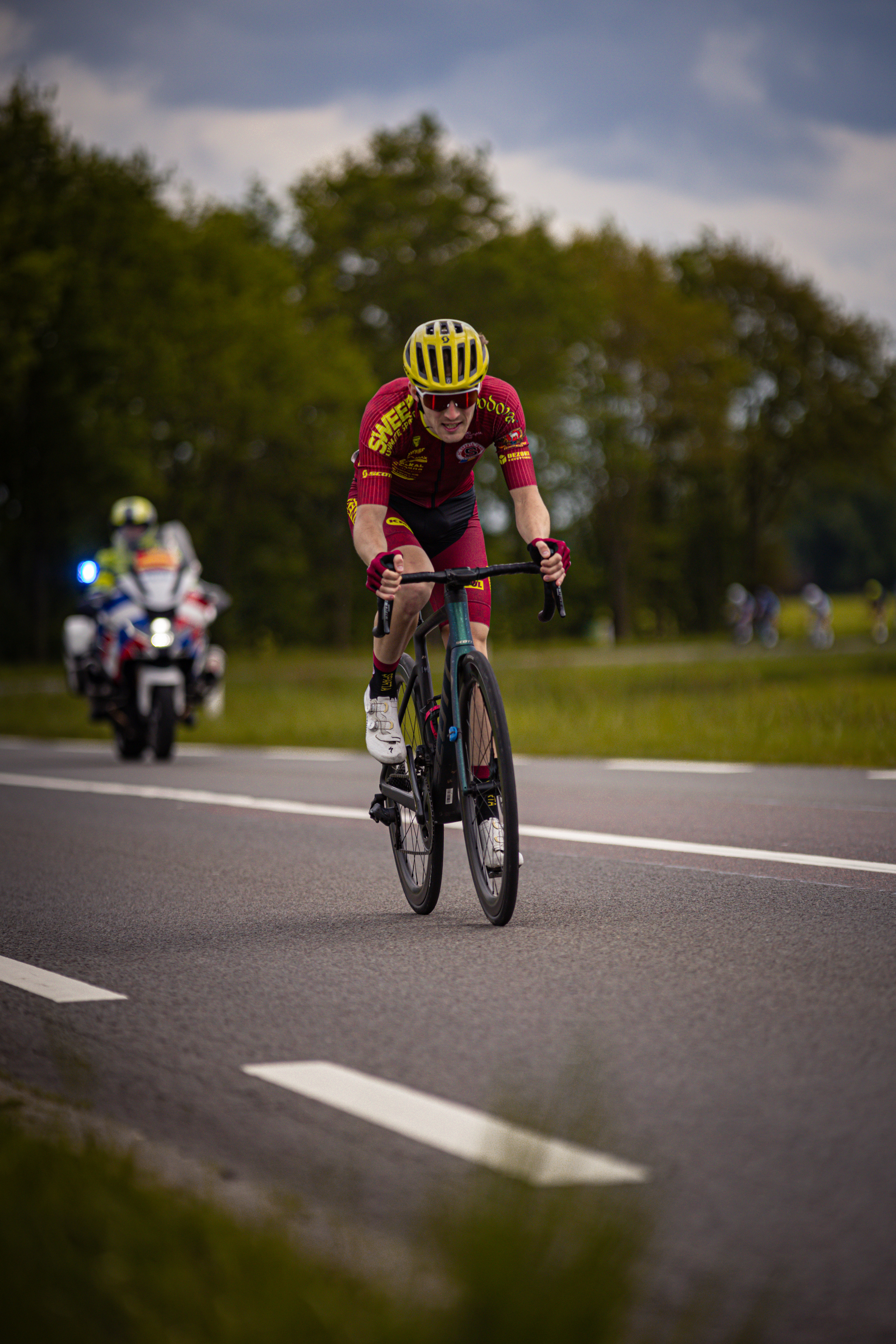 A person is riding a bicycle in the Ronde van Overijssel cycling event.