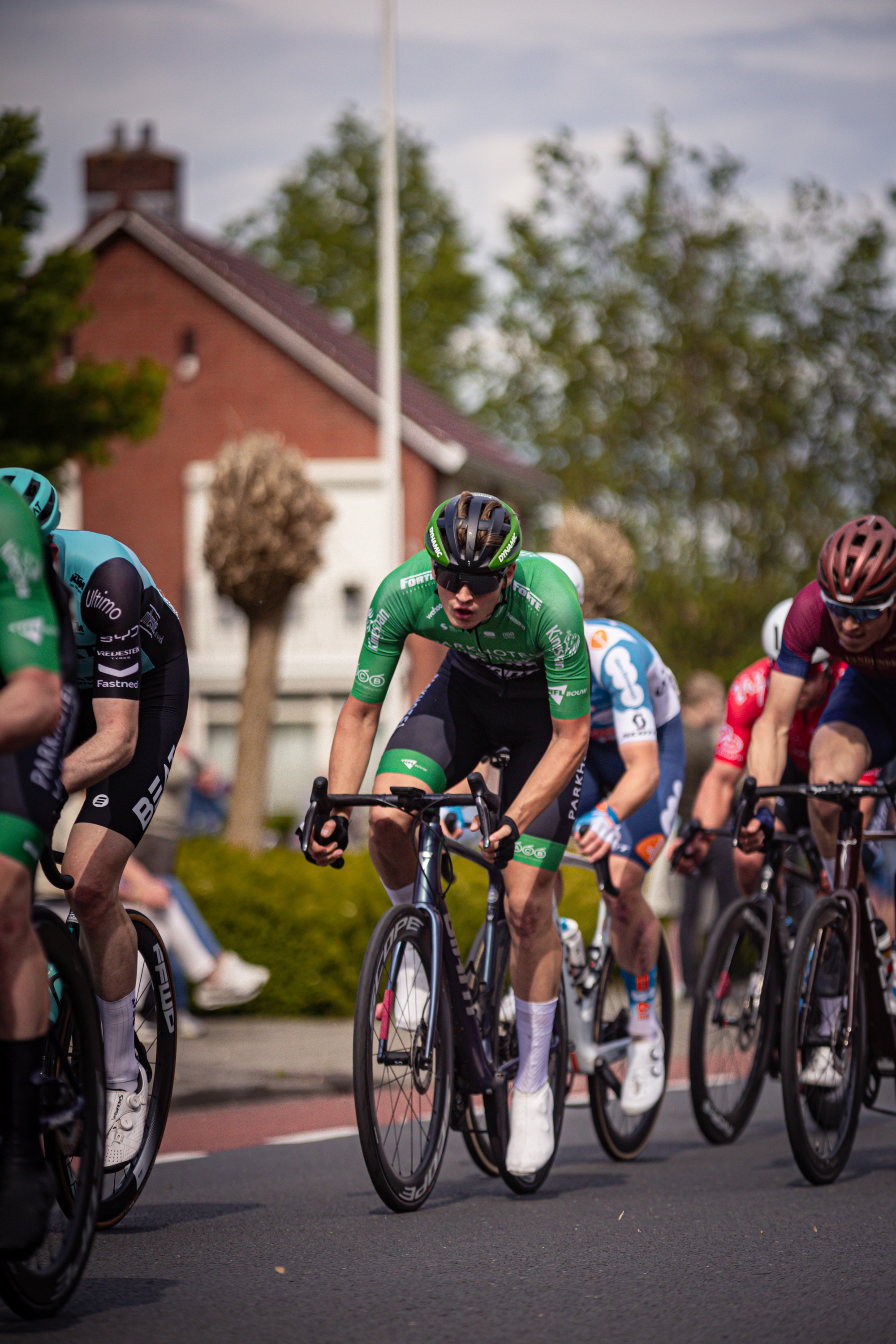 Group of cyclists participating in the 2024 Ronde van Overijssel race.