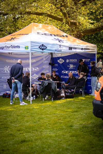 A group of people are standing outside a tent at the Rode van Overijssel event.