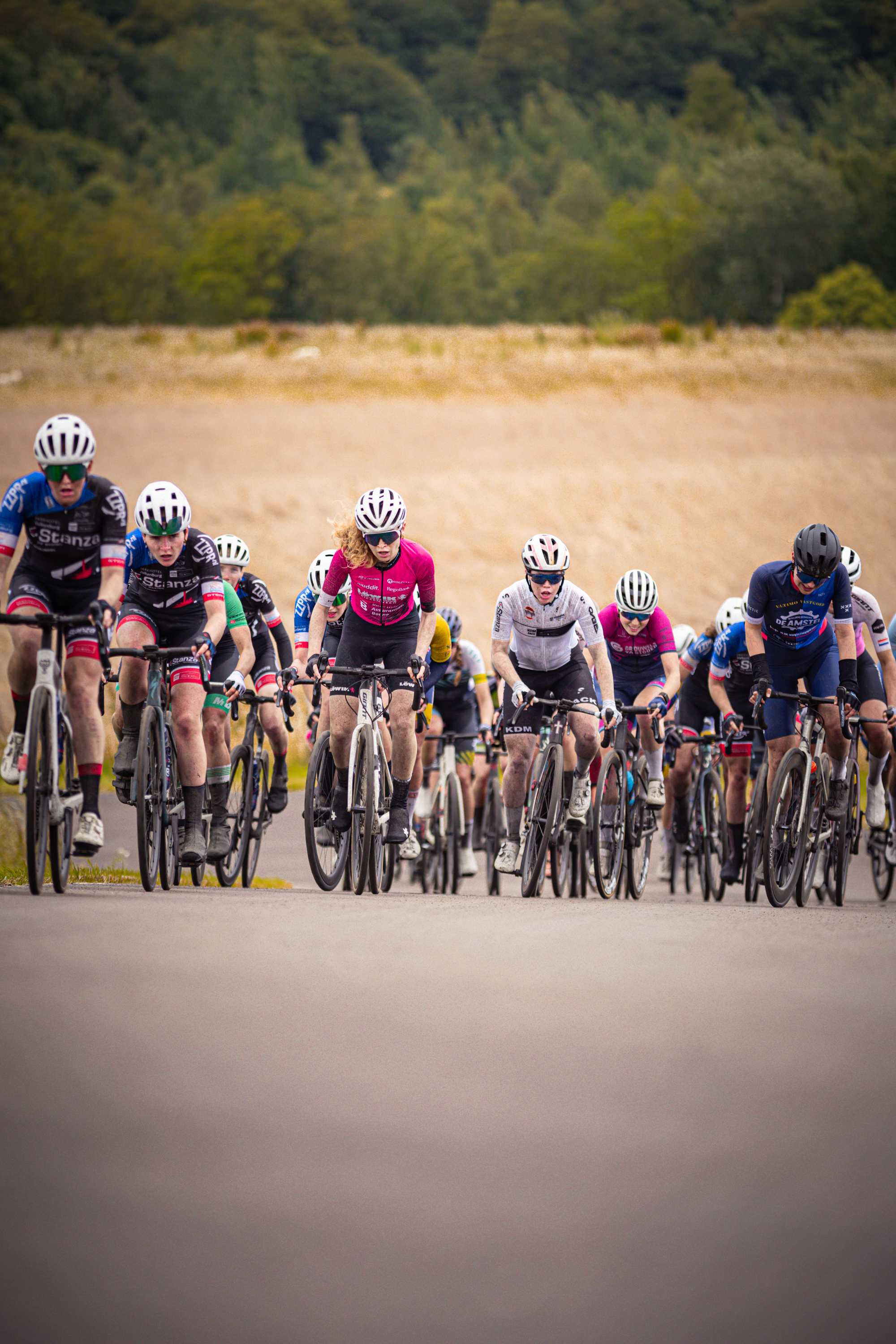 A group of cyclists participate in the 2024 Nederlands Kampioenschap.