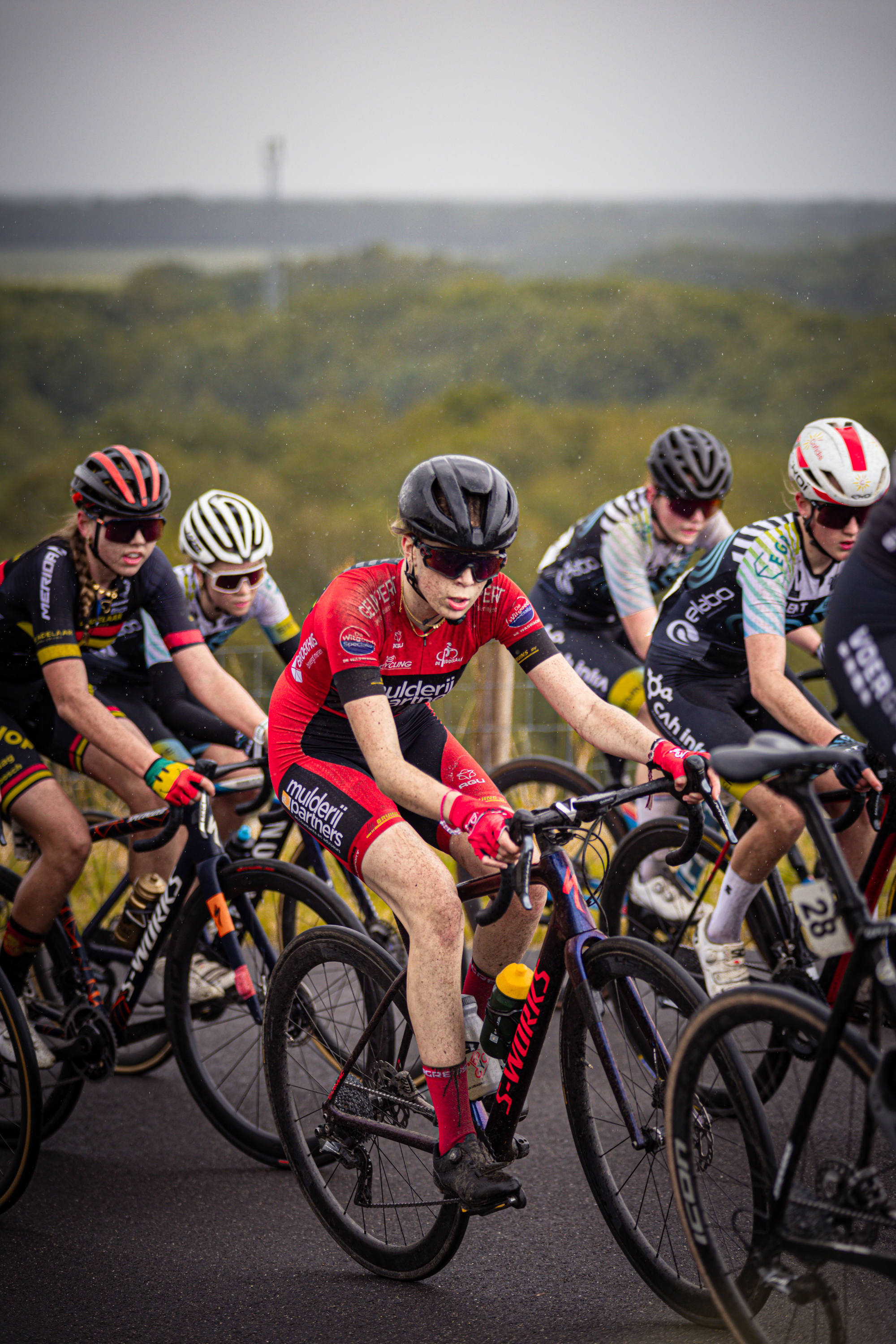 A group of cyclists participate in the Nederlands Kampioenschap.