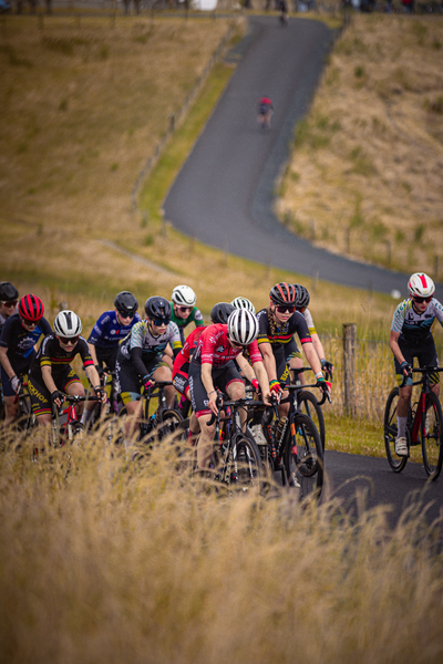 Group of cyclists riding down a trail at Nederlands Kampioenschap.