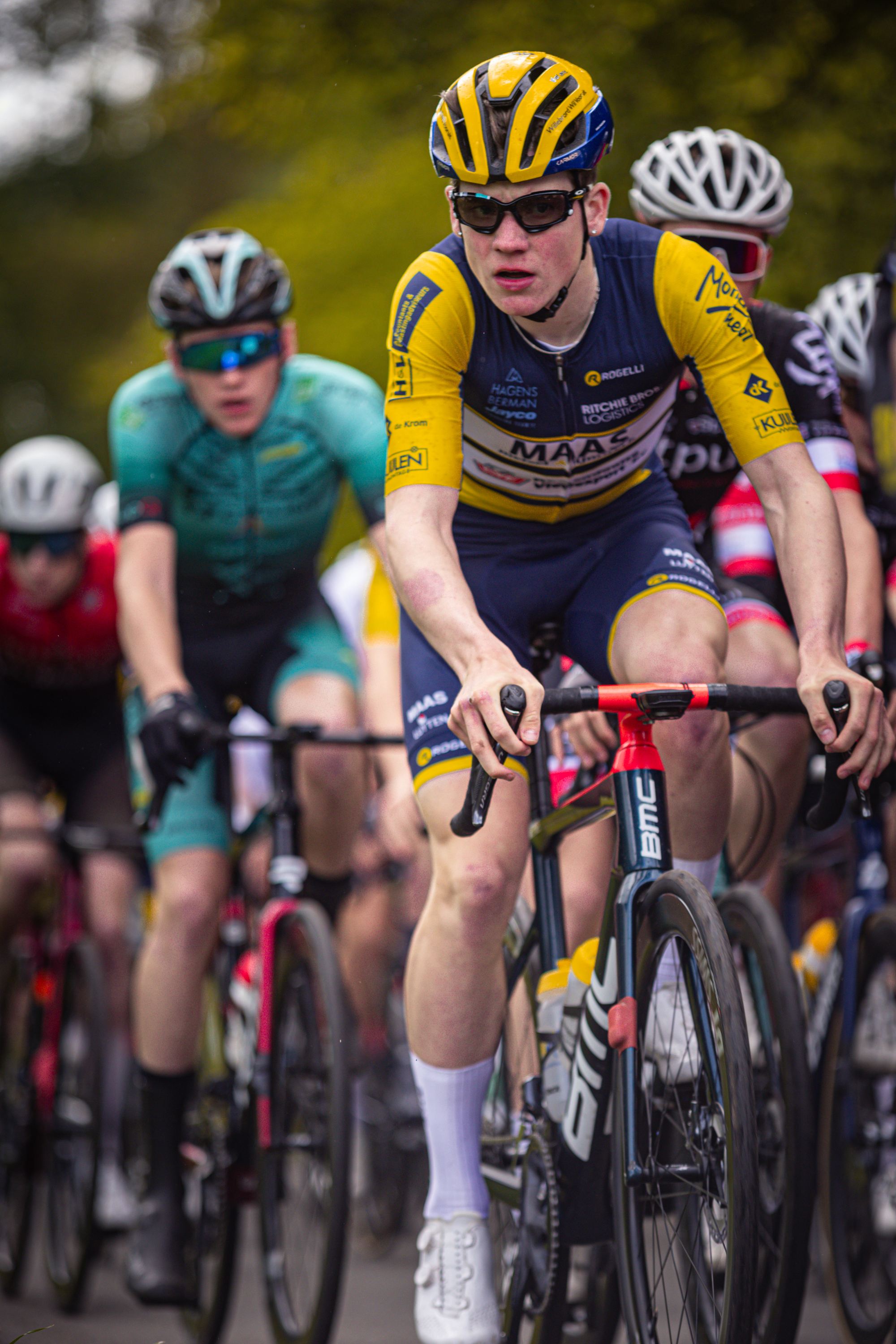 Bicycle racers race on a course during the Nederlands Kampioenschap.