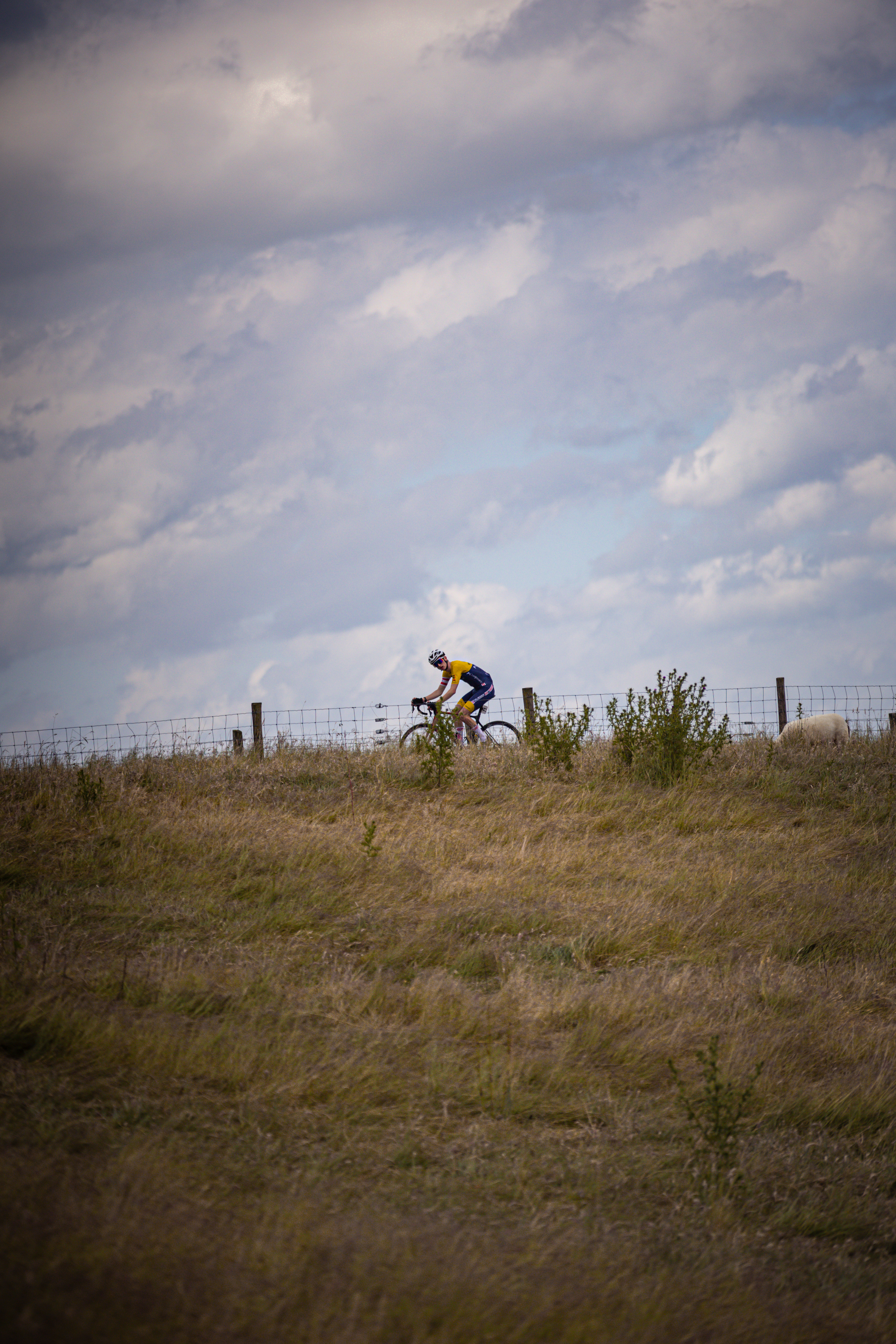 A bike racer is on the track during Nederlands Kampioenschap.