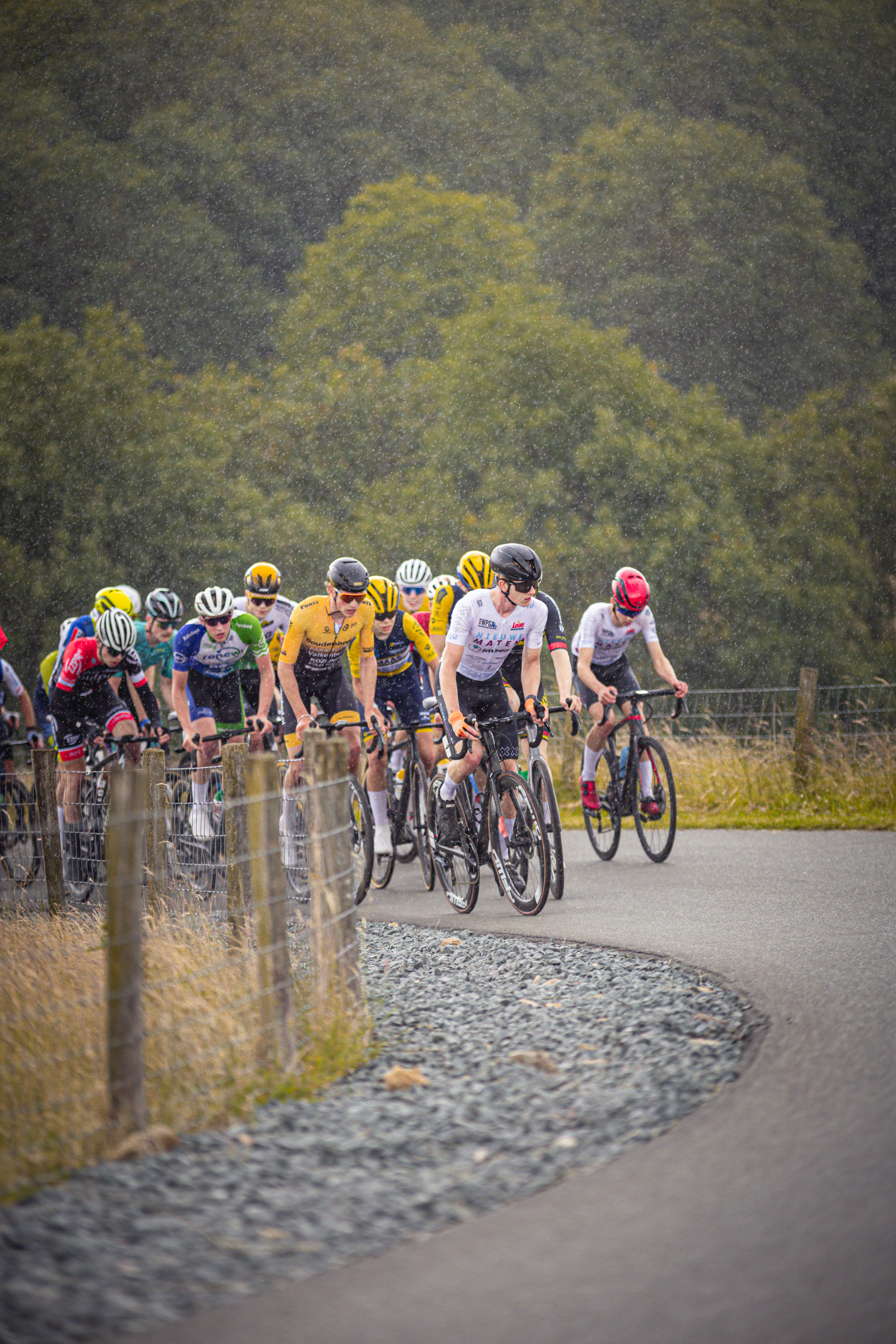 A group of cyclists participating in the Nederlands Kampioenschap.