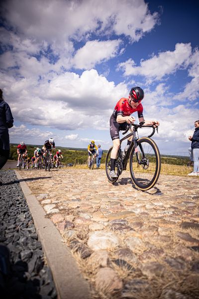 A group of people participating in a cycling race.