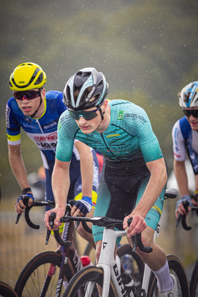 Junioren Mannen are seen riding their bicycles, ready to compete in the Nederlands Kampioenschap.