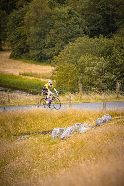 A person on a bike is participating in the Nederlands Kampioenschap.