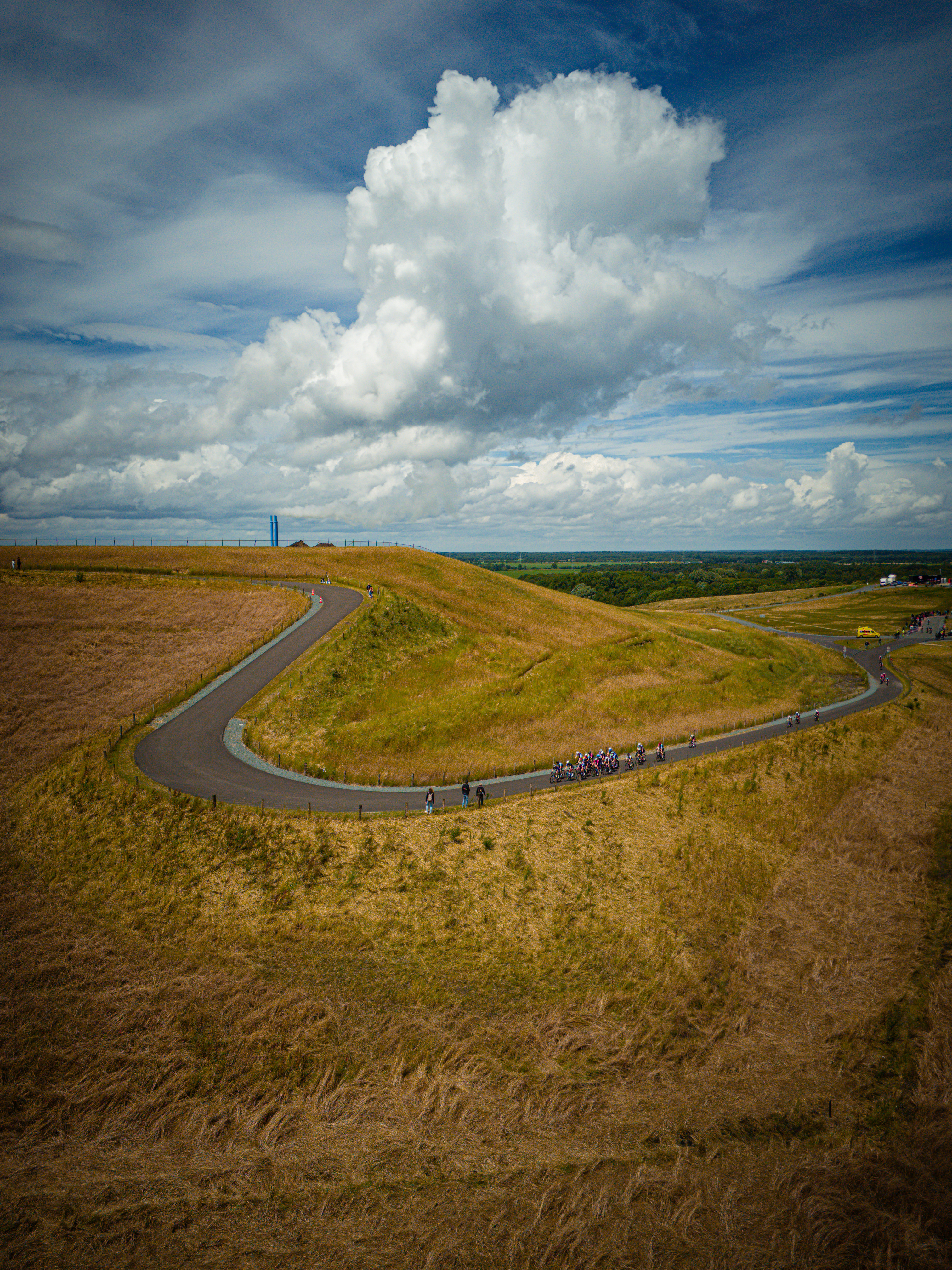 A group of cyclists on a hill at the Nederlands Kampioenschap.