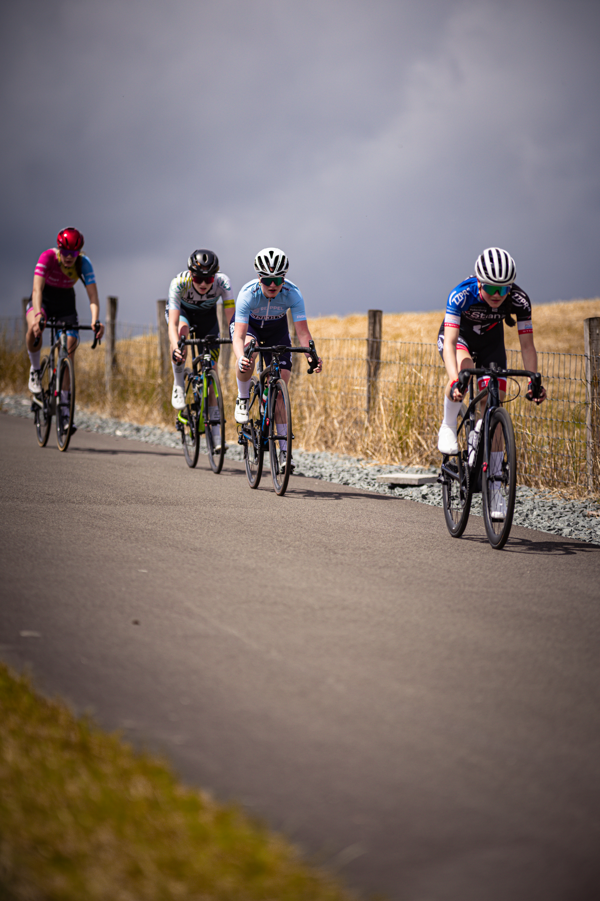 A group of cyclists participating in the Nederlands Kampioenschap in 2024.