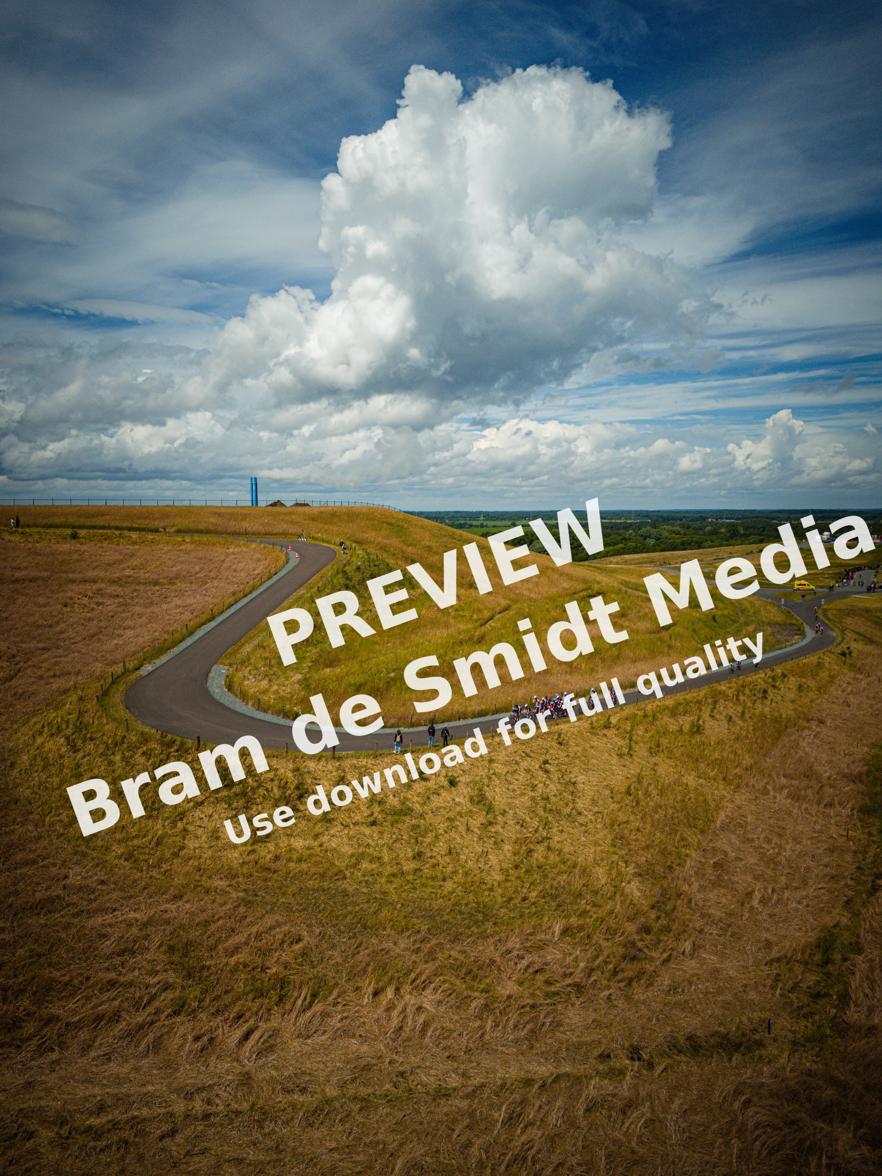 A group of cyclists on a hill at the Nederlands Kampioenschap.