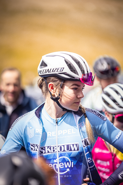 A woman in a blue and white jersey representing Repell on the front.