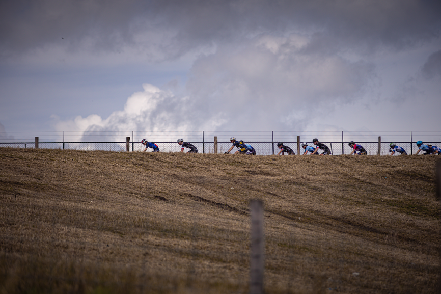 A group of cyclists participating in a cycling race.