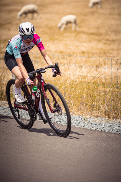 A woman racing her bike during the Nederlands Kampioenschap.