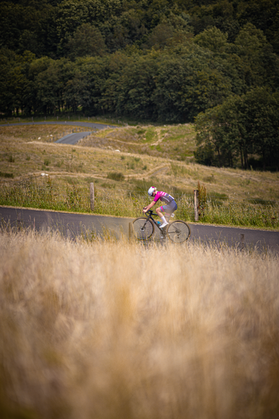 A cyclist is in action during the Nederlands Kampioenschap in 2024.