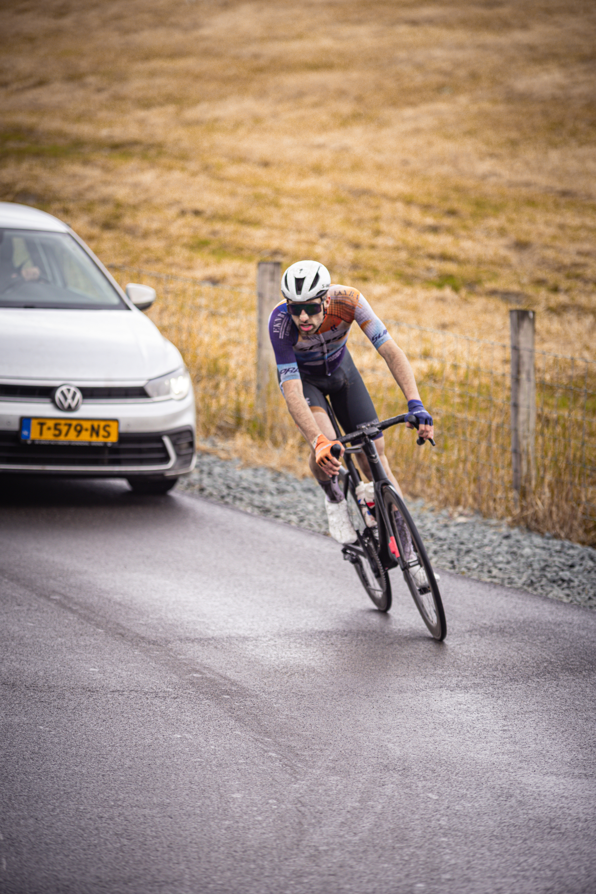 A man is on his bike racing in the 2024 Nederlands Kampioenschap.