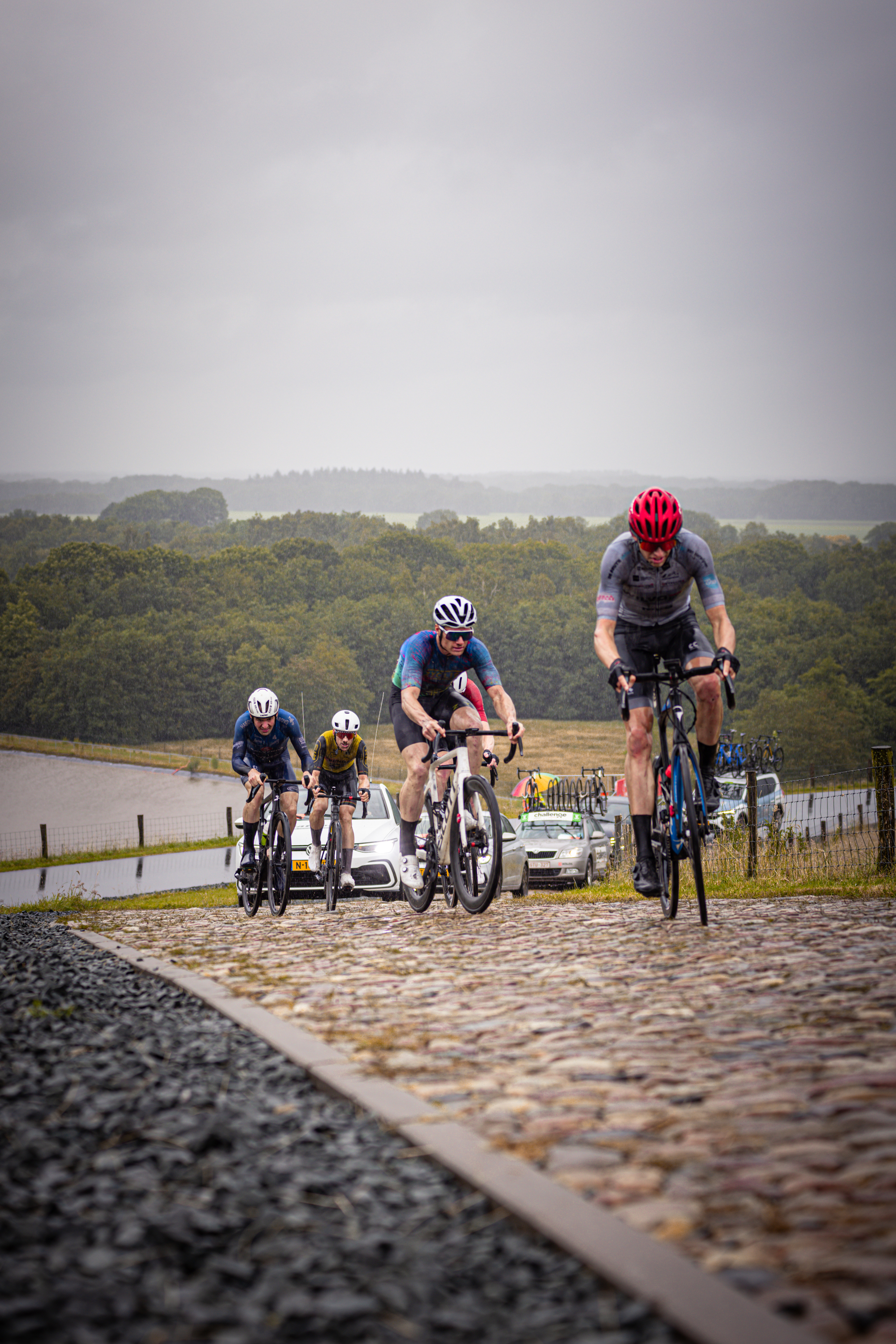 The riders are participating in a cycling competition.