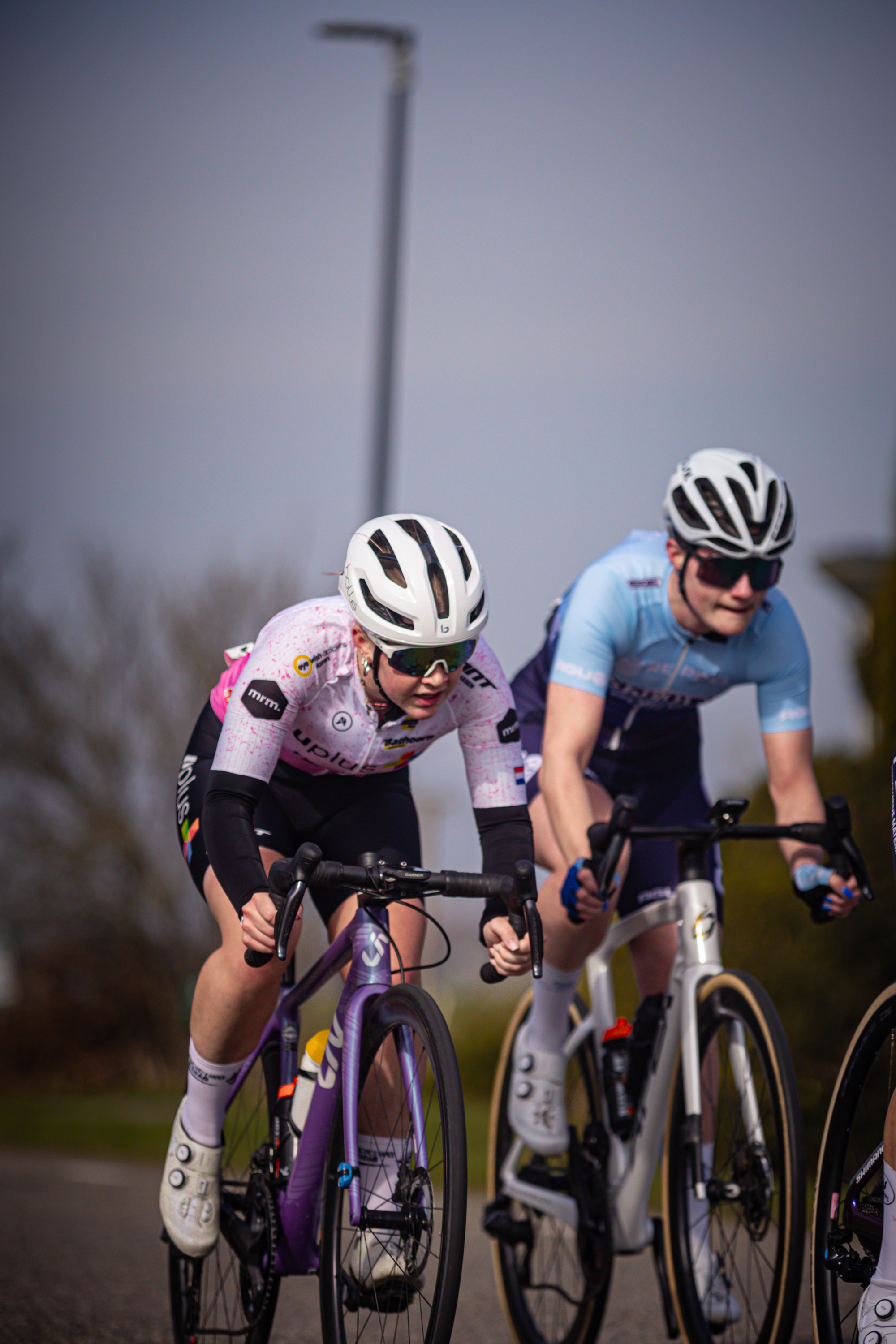 Two cyclists racing in the Drentse 8 van Westerveld.