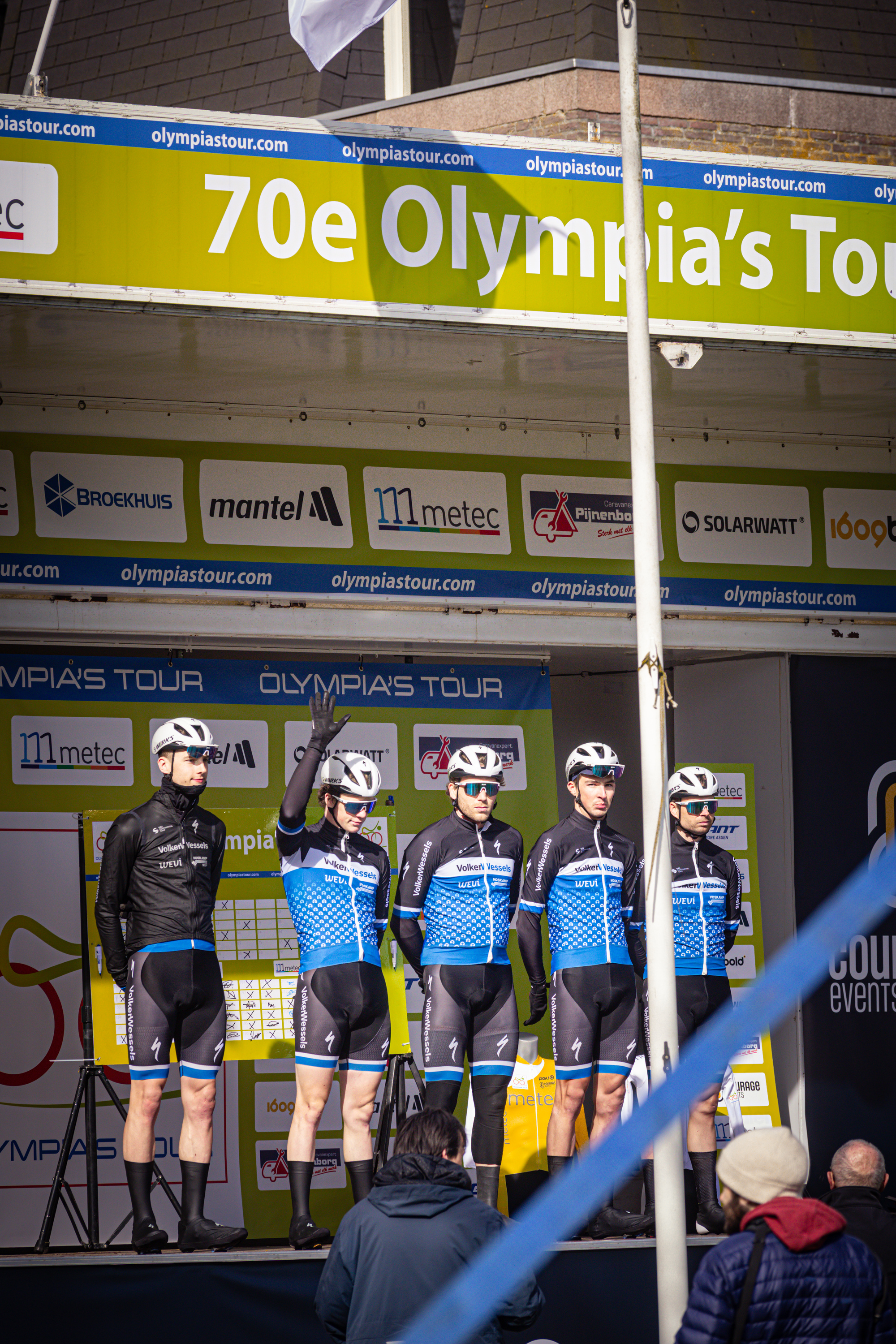 A group of cyclists on stage at the 70e Olympia's Tour.