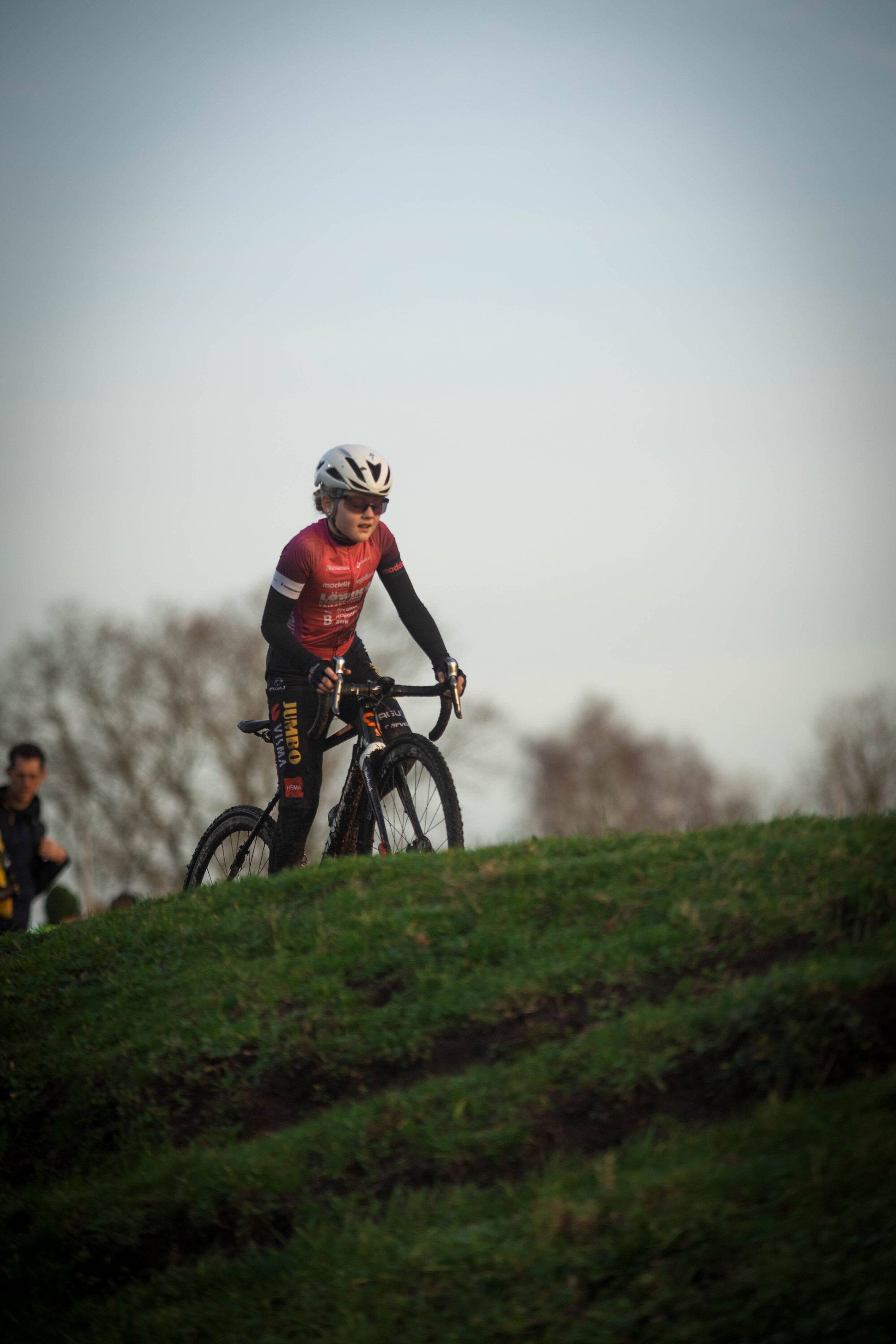 a person on a bike with the word cyclocross written on it.