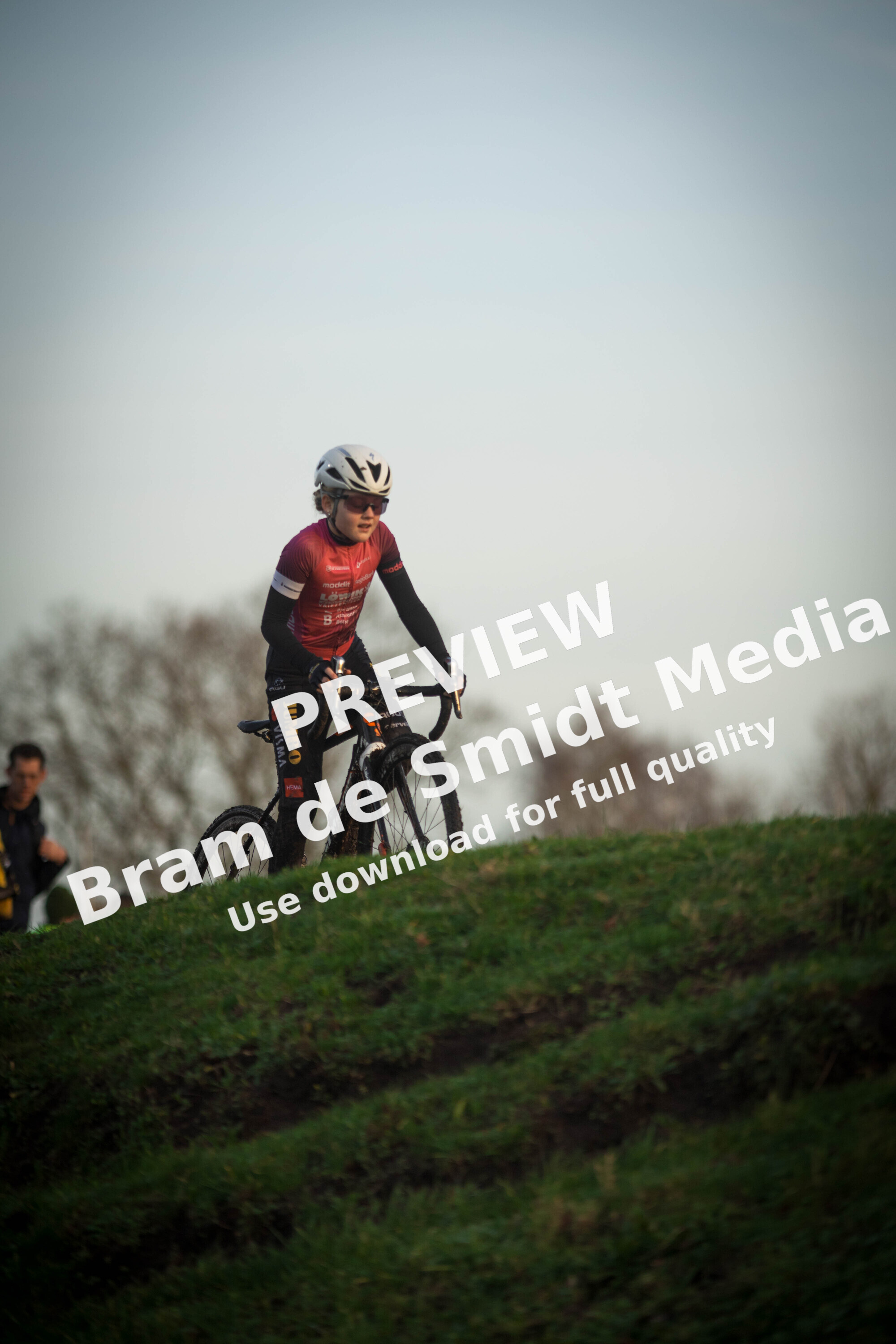 a person on a bike with the word cyclocross written on it.