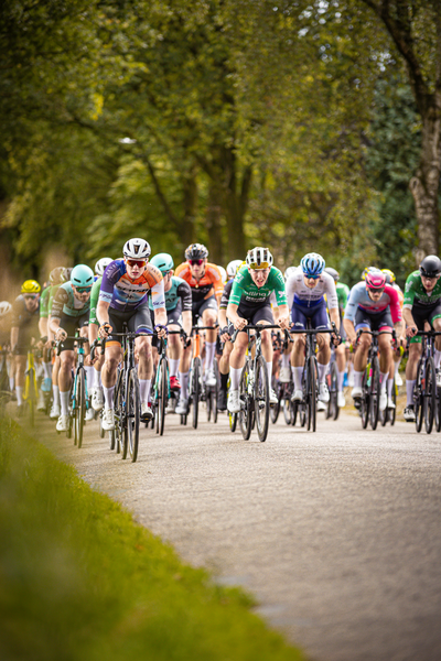 A group of bicycle racers participating in the Midden Brabant Poort Omloop.