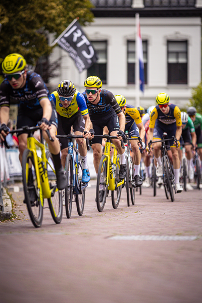 A group of cyclists in a race at the Midden Brabant Poort Omloop.