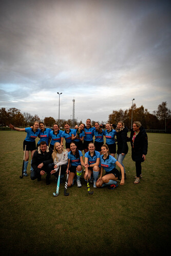 Hockey Team SMHC 19-11, Blue and Black uniforms, 10 people.