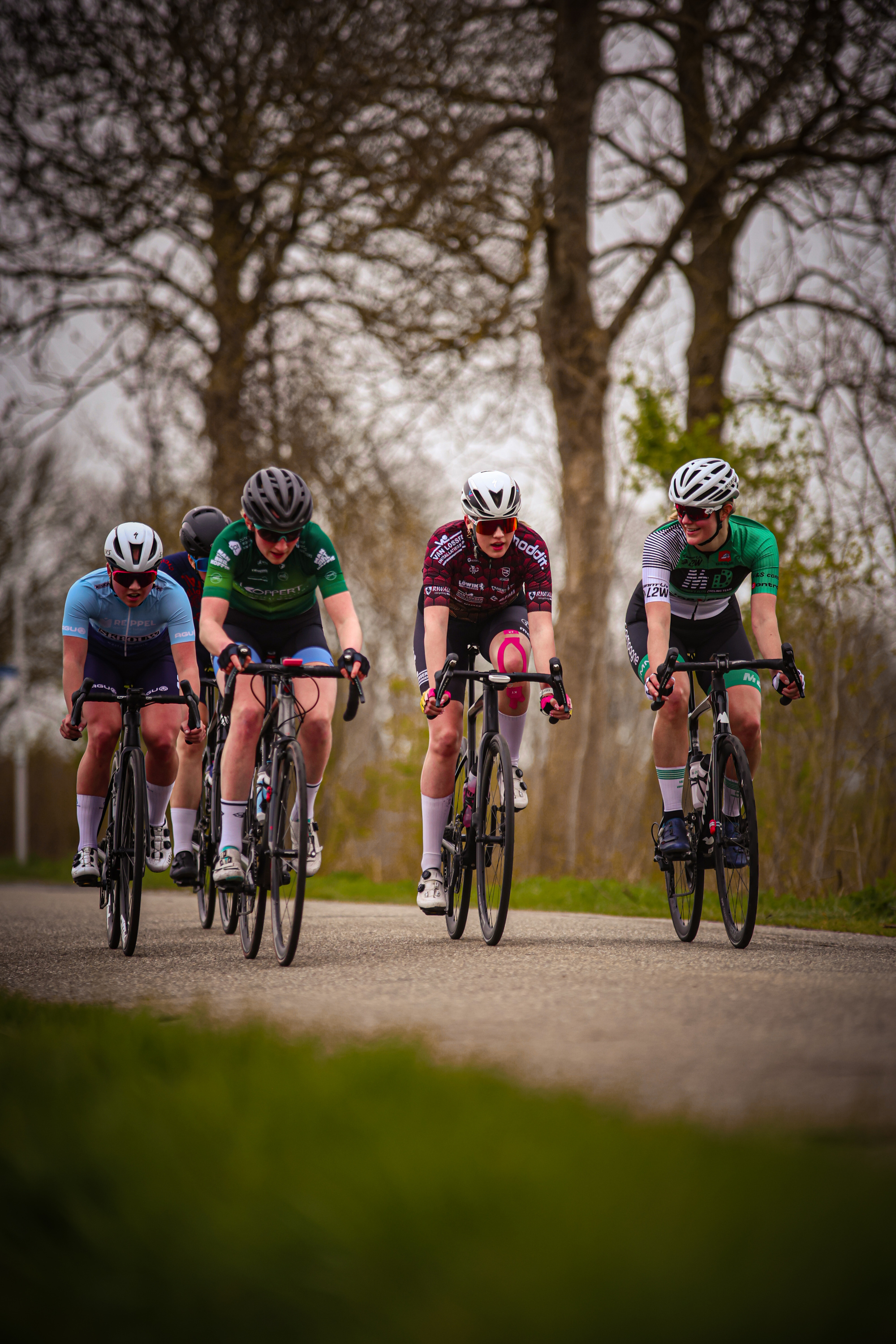 A cyclist is riding a bike in the Rode van de Lichtmis.