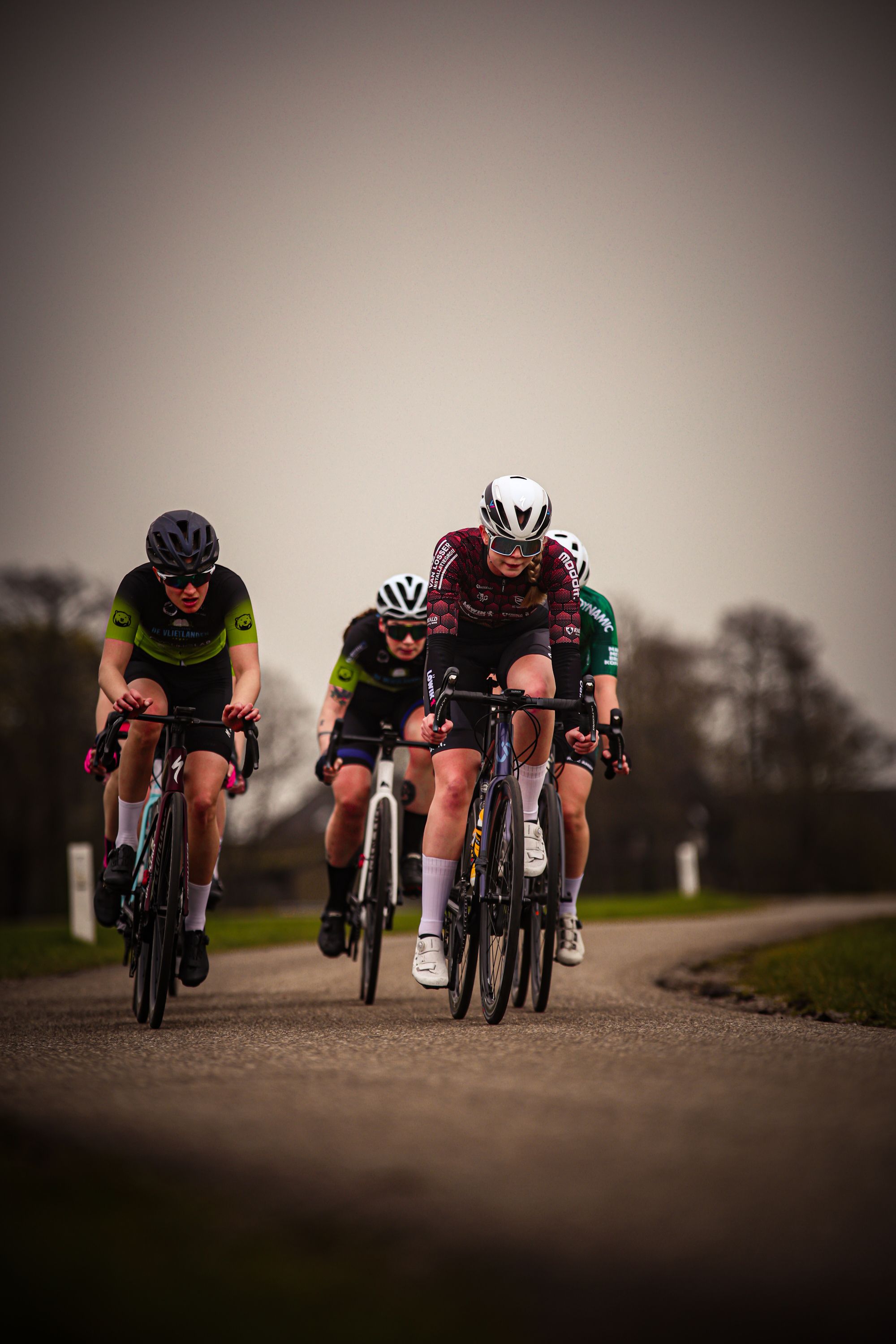 The cyclists are taking part in the Ronde van de Lichtmis, a cycling race.