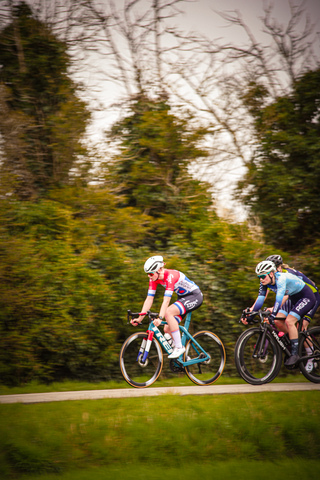 Two cyclists racing on a rural road during the Ronde van de Lichtmis.