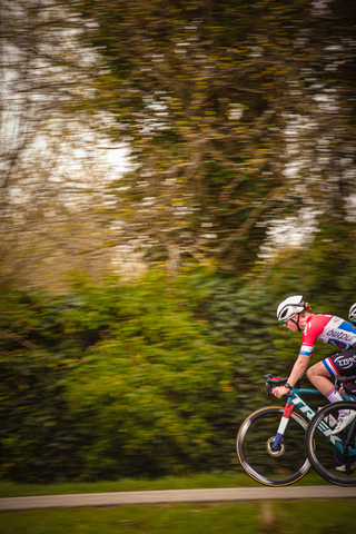 A cyclist racing in the Ronde van de Lichtmis race.