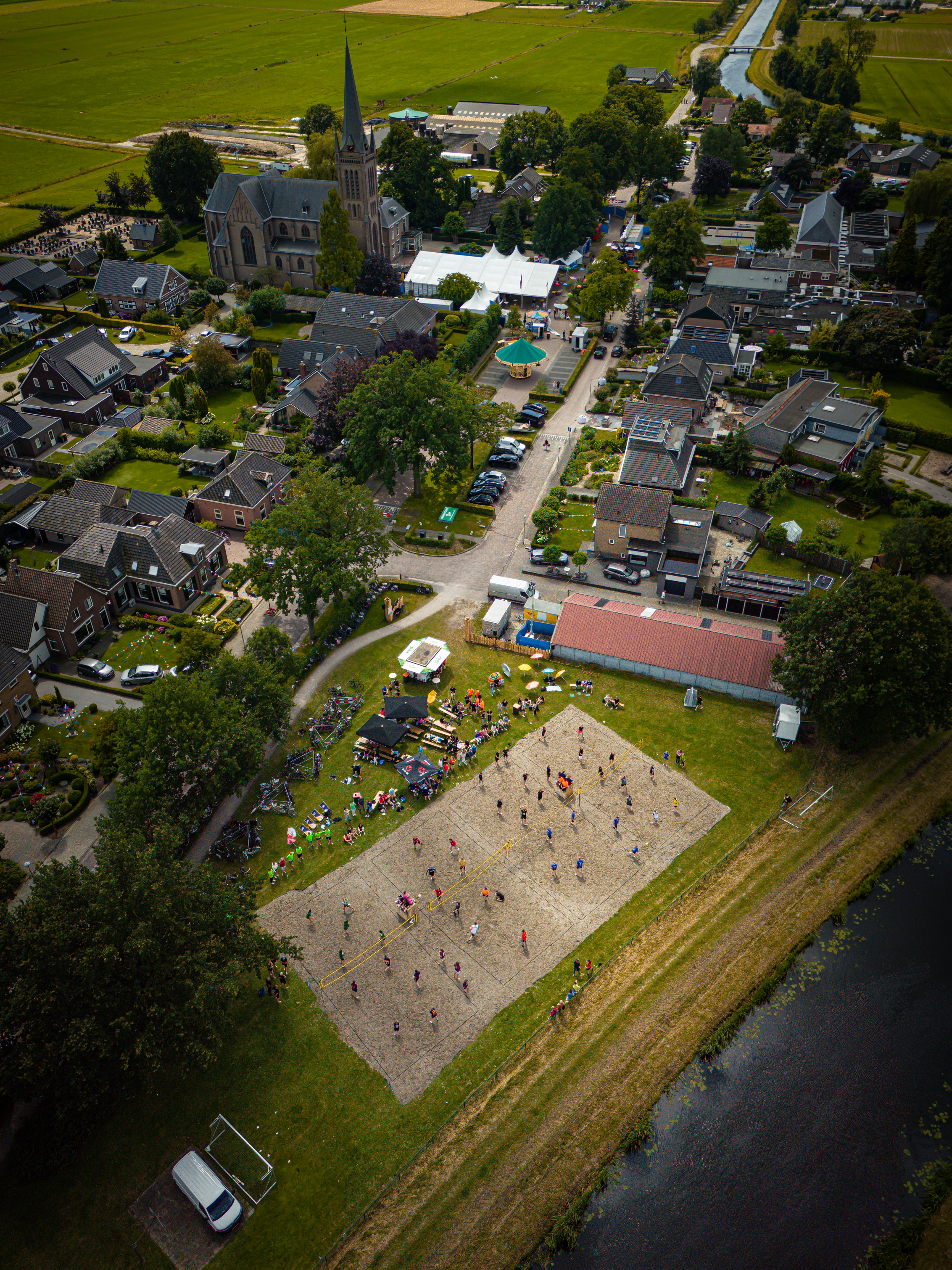 An aerial view of a beach volleyball game at Kermis Boerhaar.