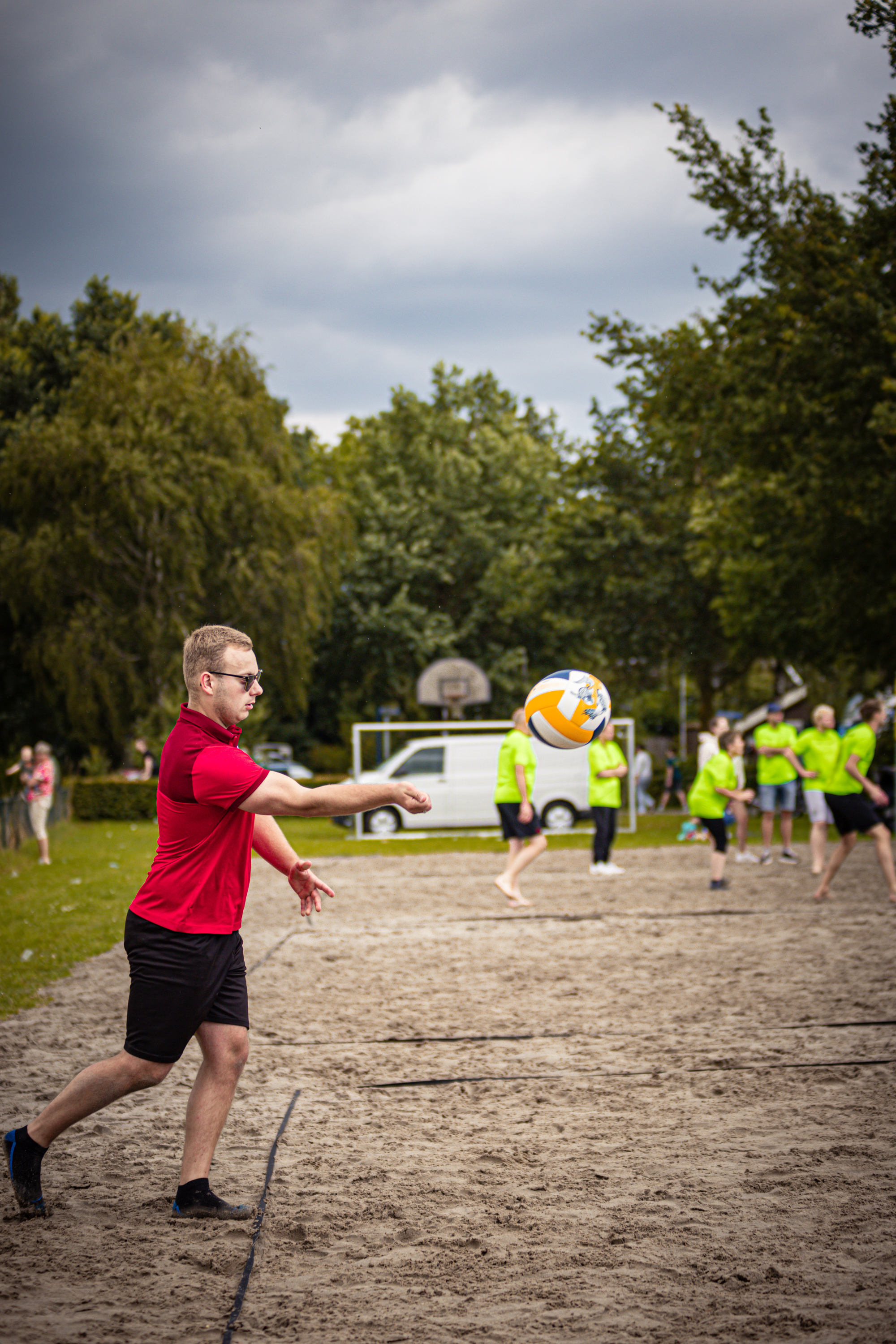 Kermis Boerhaar is shown playing beach volleyball in the image.