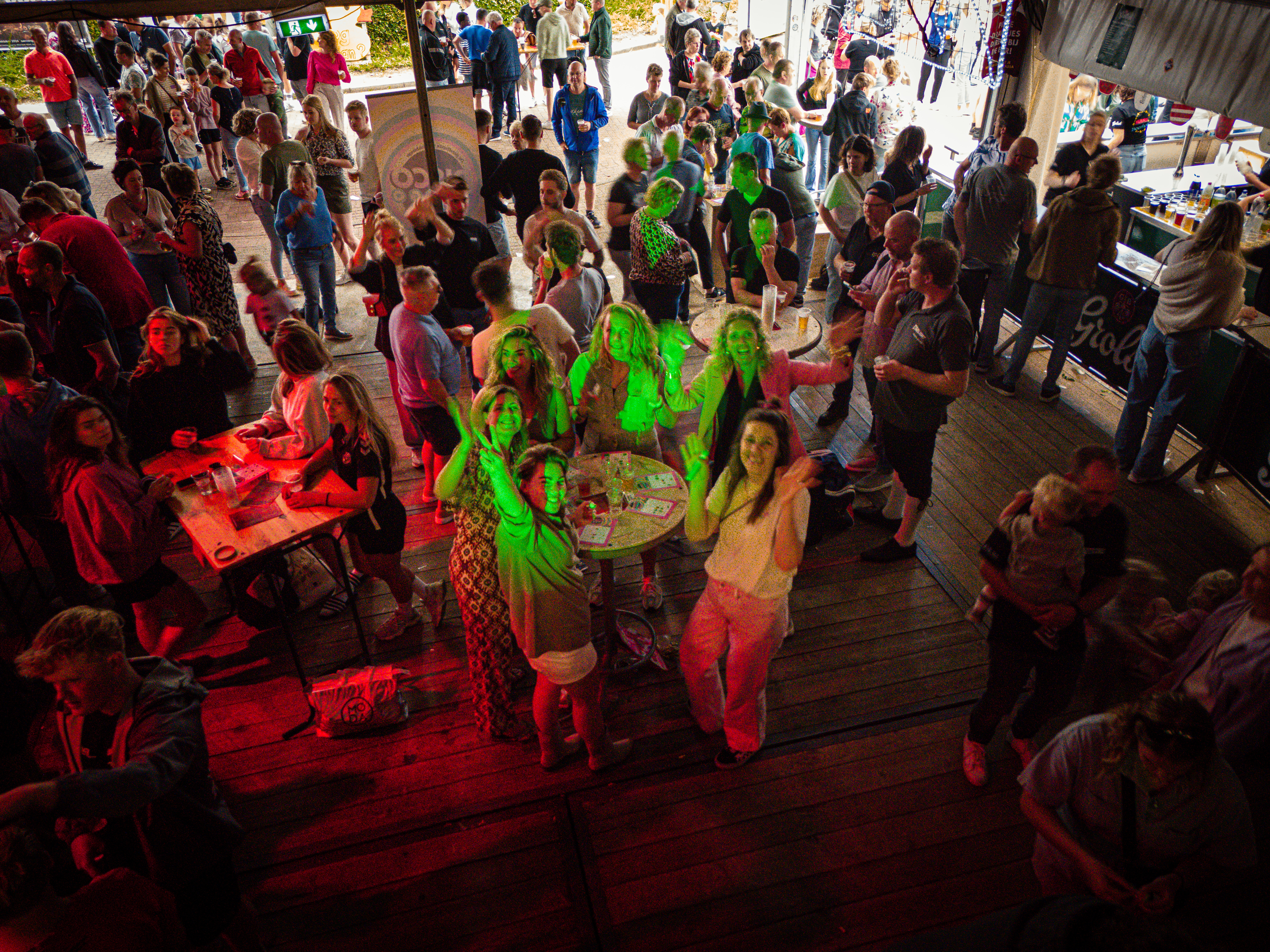 "Kermis Boerhaar, Middag & avond, people gathered around food tables".