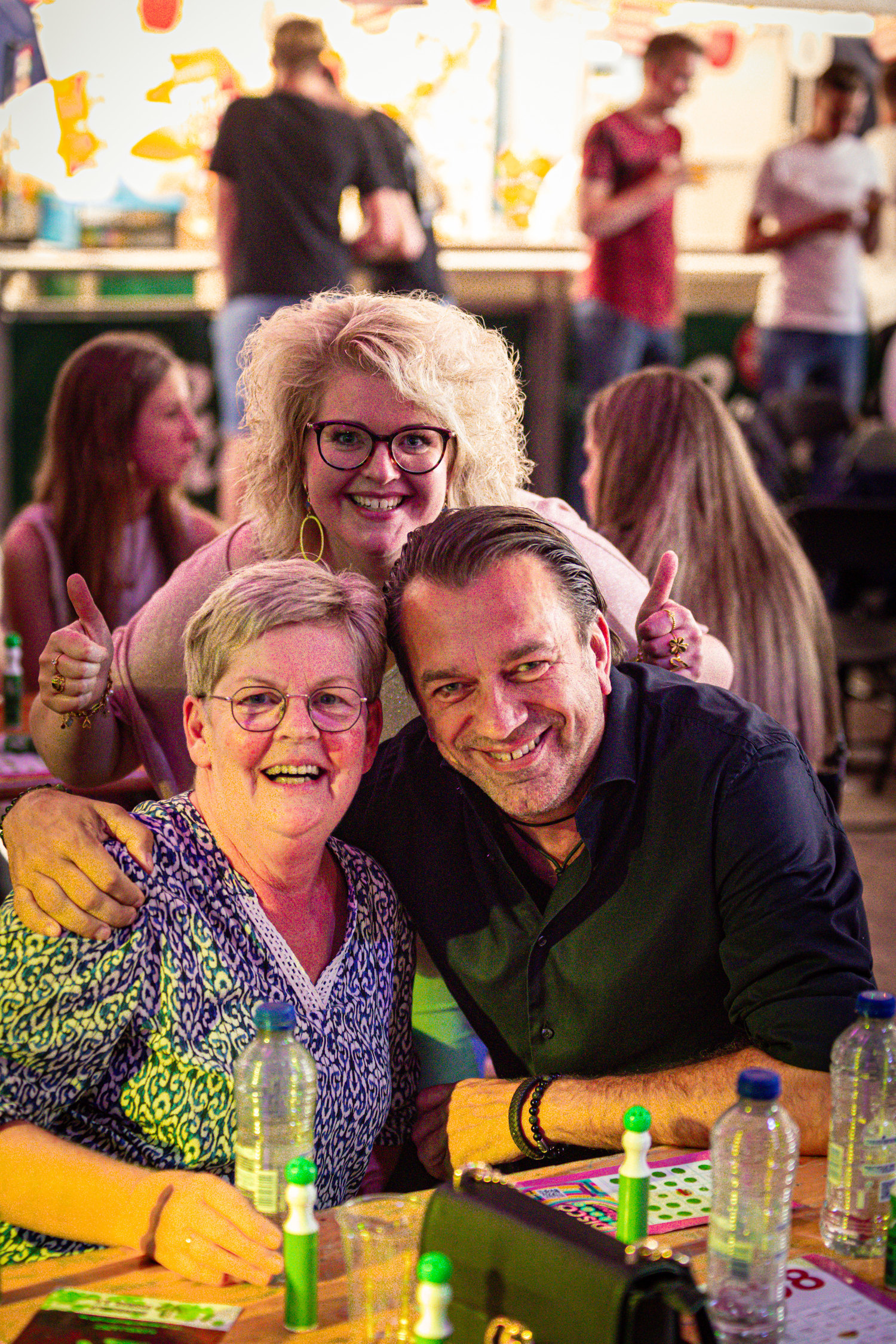 A group of people posing for a photo at Kermis Boerhaar.