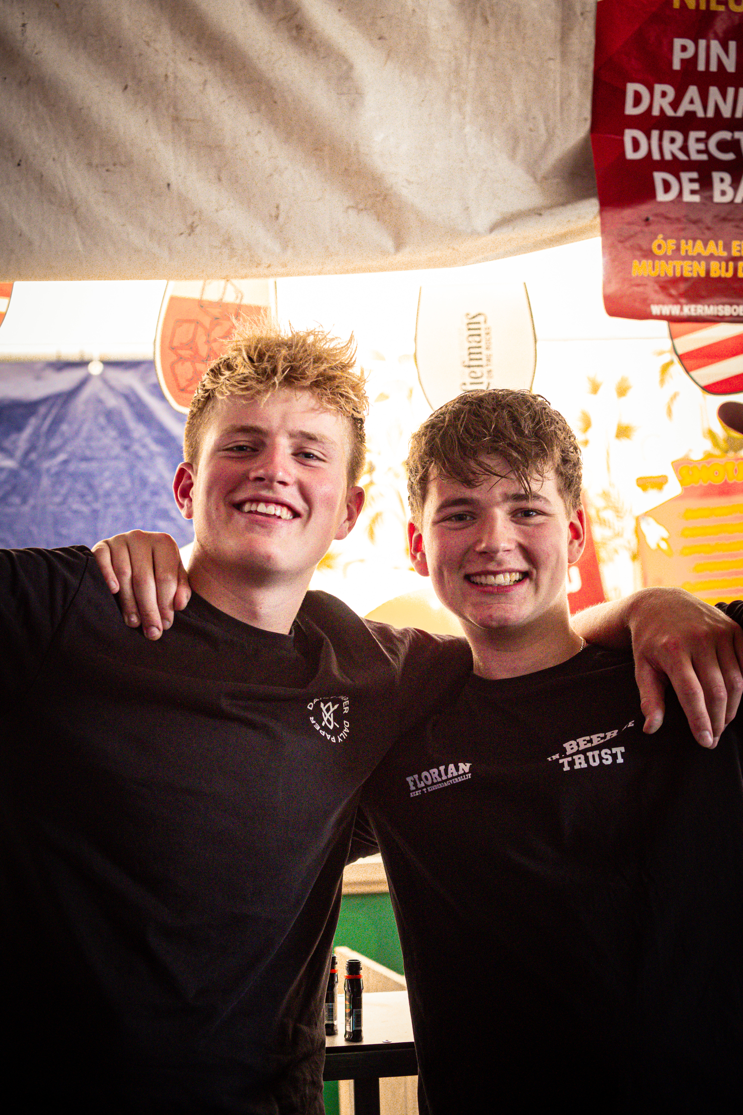 Two boys posing for a photo at the Kermis Boerhaar.