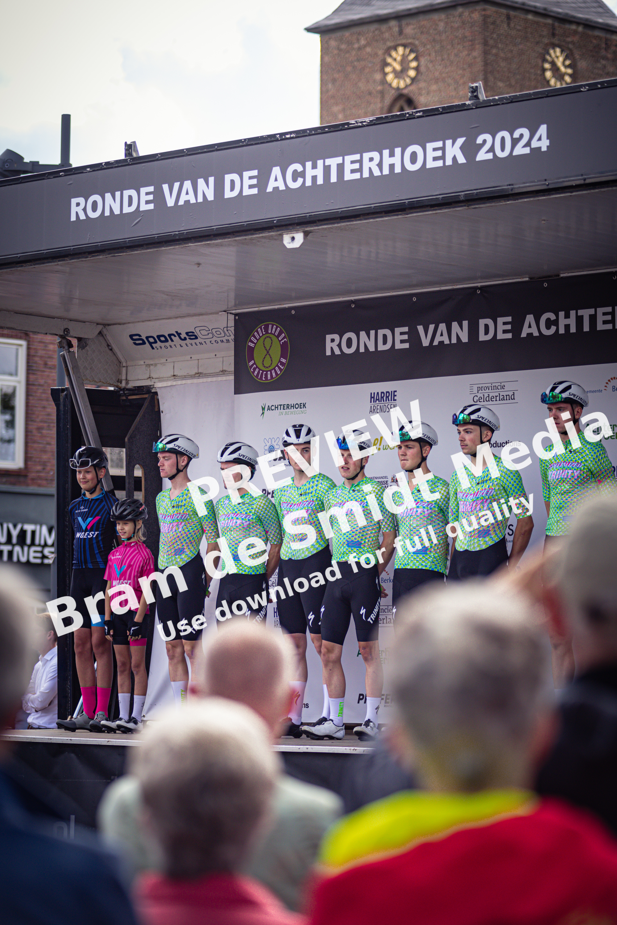 People stand on a stage at the Ronde van de Achterhoek 2024.