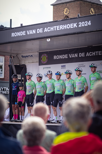 People stand on a stage at the Ronde van de Achterhoek 2024.