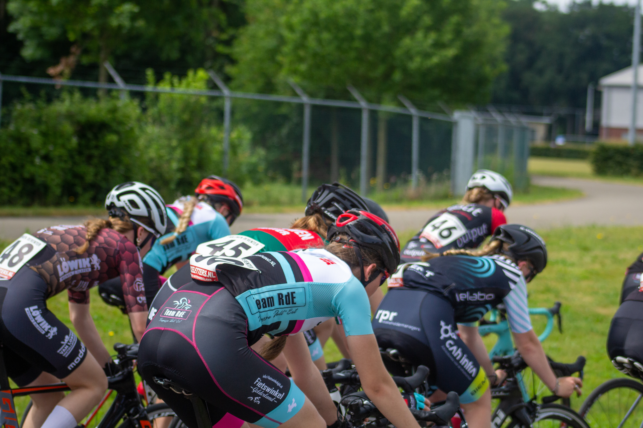 A group of cyclists racing in the Dames ronde van Deventer race.