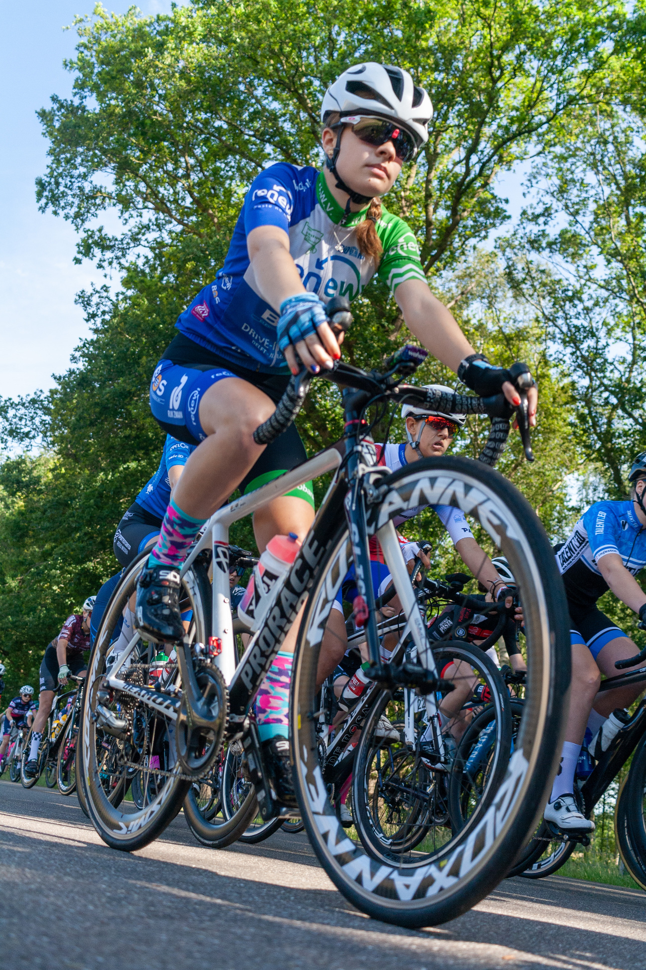 A group of bicyclists are participating in a race.