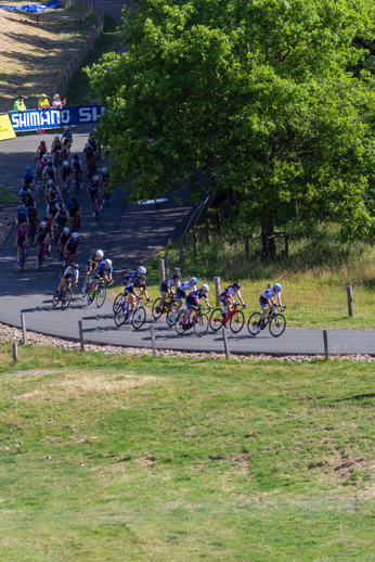 A bicycle race is taking place in 2022 with female participants.