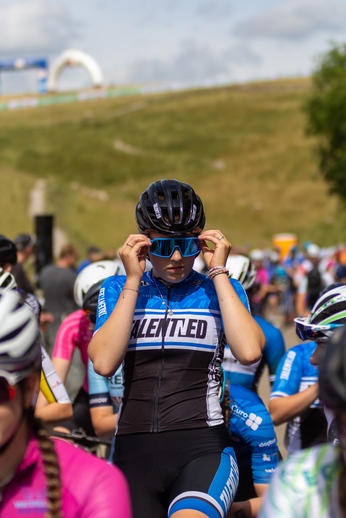 A group of cyclists, one wearing a jersey with the word "Velen" on it.