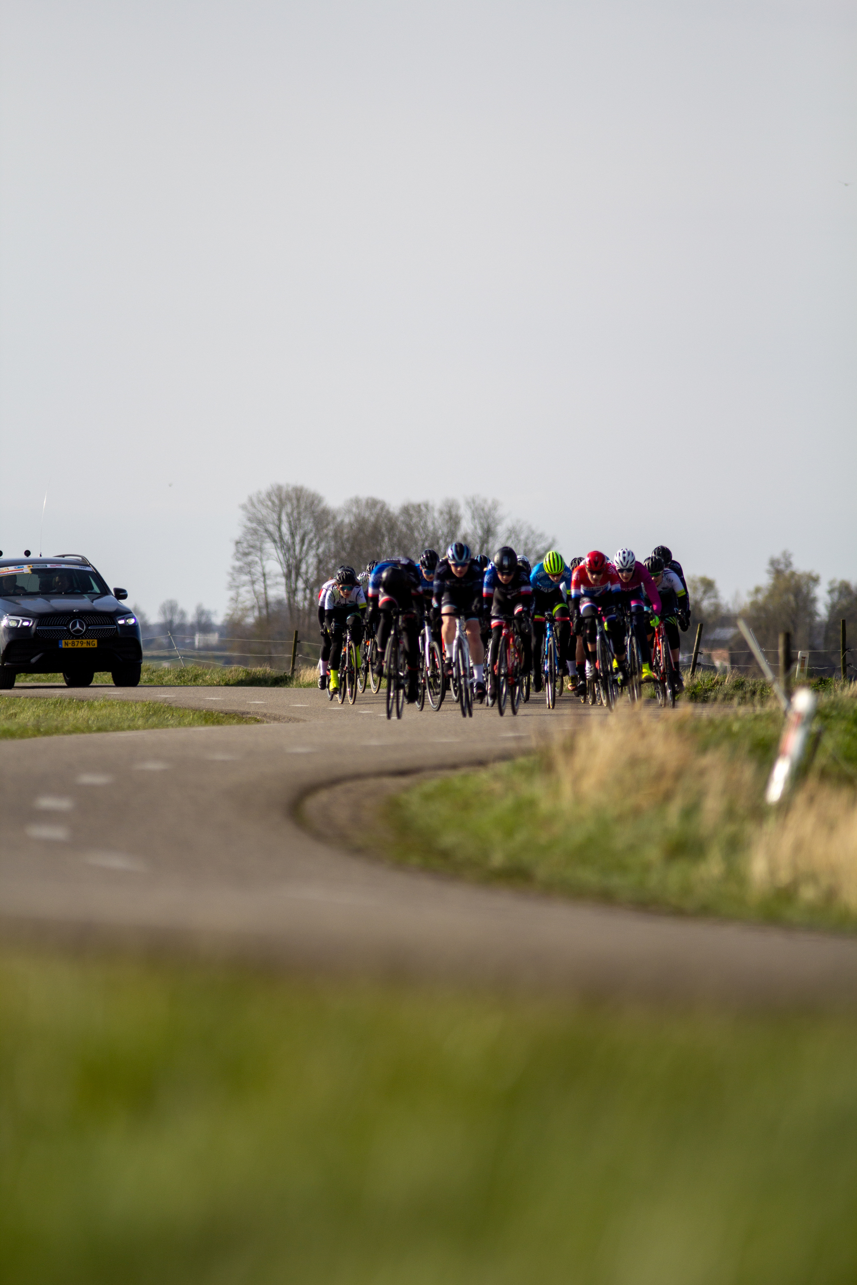 A group of cyclists in a race sponsored by Gatorade.