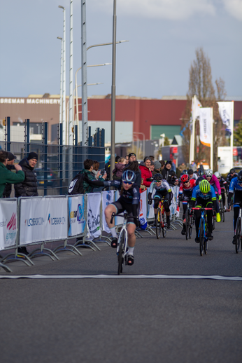 A group of people participating in a cycling race.