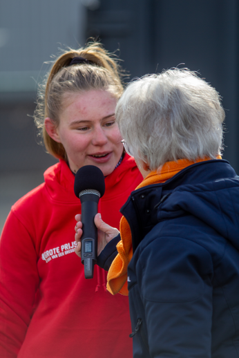 Two women are talking on a street in the Netherlands.