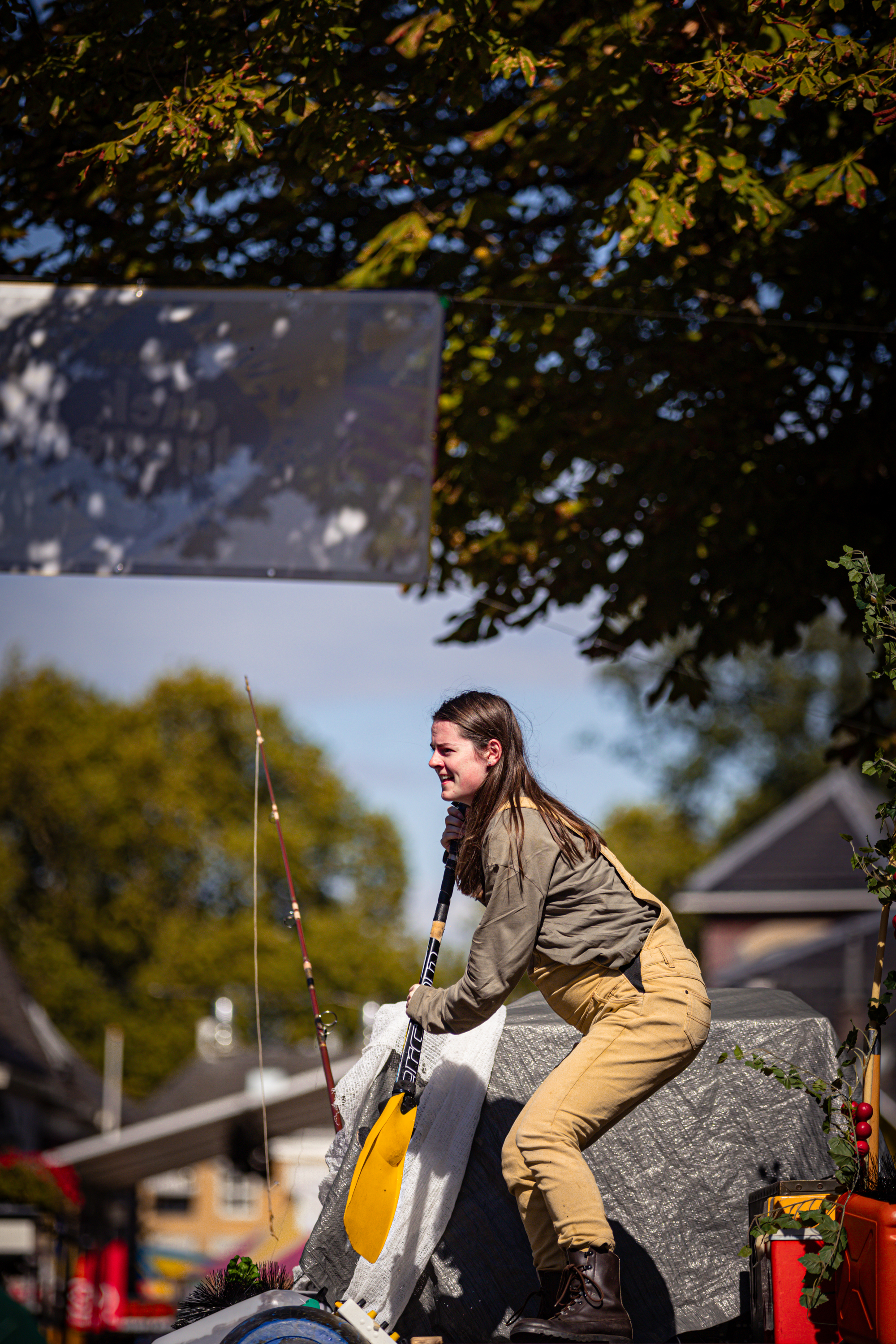 A woman casting a fishing line at the V.IJ.F. Festival.