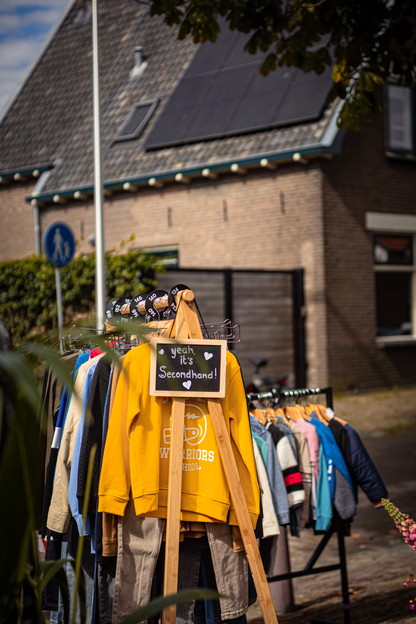 A display of clothing for sale at the V.I.J.F. Festival.